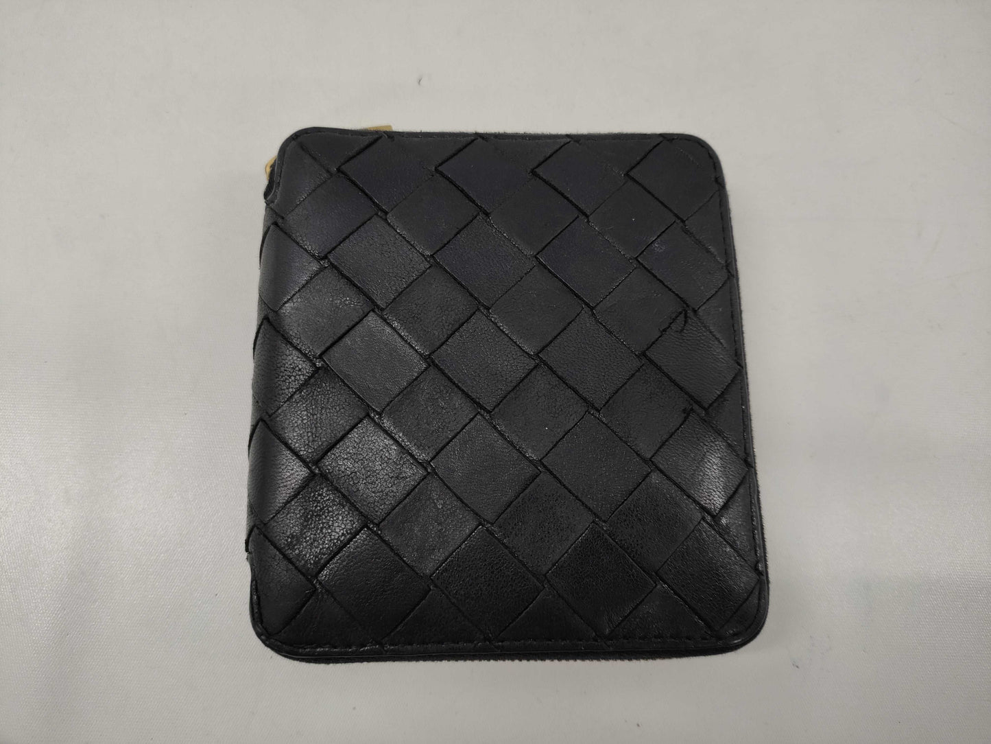 BOTTEGA VENETA Intrecciato Round Zip Bi-fold Wallet in Black Leather