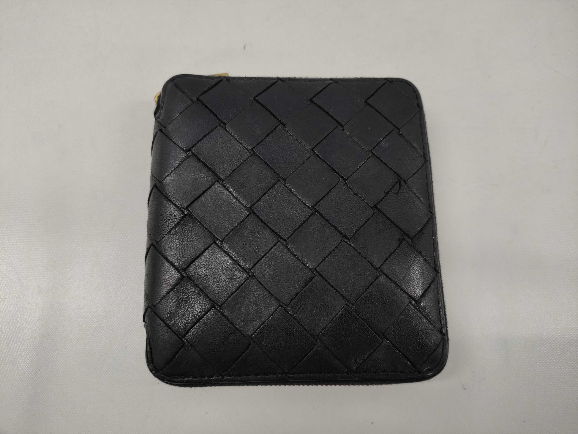 BOTTEGA VENETA Intrecciato Round Zip Bi-fold Wallet in Black Leather