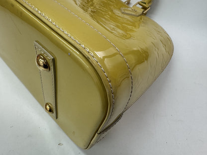 LOUIS VUITTON Alma PM Jaune Passion Handbag