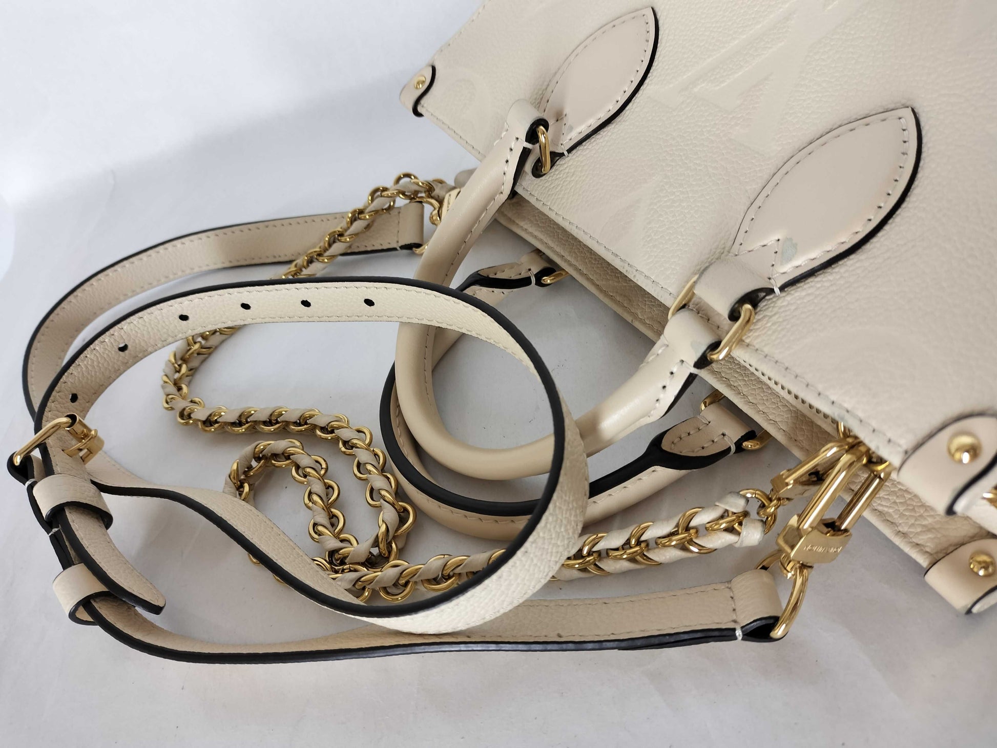 LOUIS VUITTON Monogram Empreinte On-the-Go EW IC Shoulder Bag