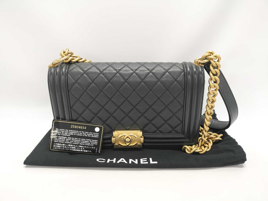 CHANEL Boy Black Lambskin Matelasse Shoulder Bag with Gold Hardware and Chain, 25 Series