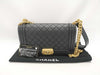 CHANEL Boy Black Lambskin Matelasse Shoulder Bag with Gold Hardware and Chain, 25 Series