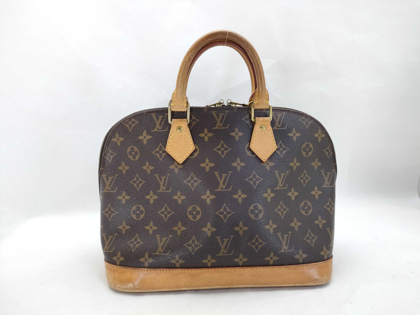LOUIS VUITTON Monogram Alma Handbag