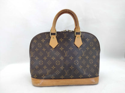 LOUIS VUITTON Monogram Alma Handbag