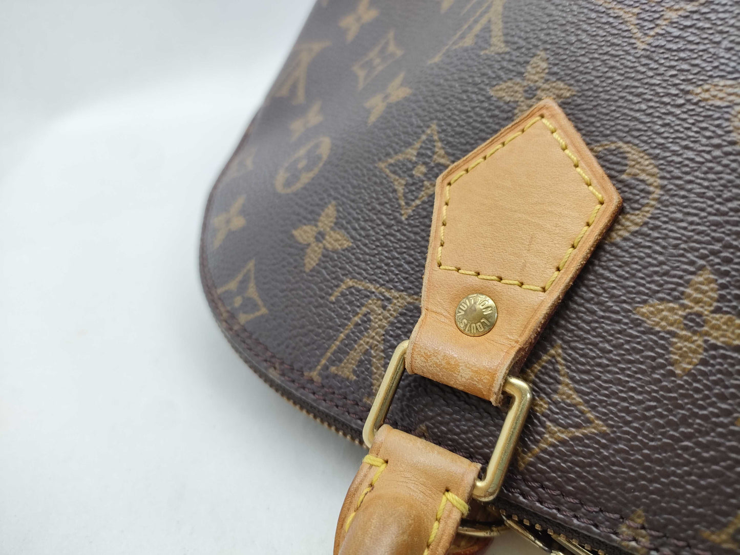 LOUIS VUITTON Monogram Alma Handbag