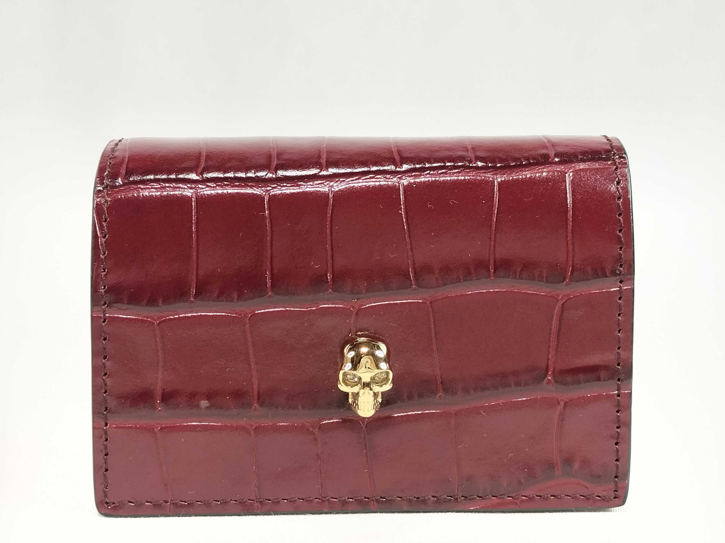 Excellent condition Alexander McQueen skull chain card case.