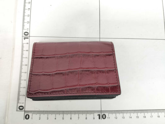 Excellent condition Alexander McQueen skull chain card case.