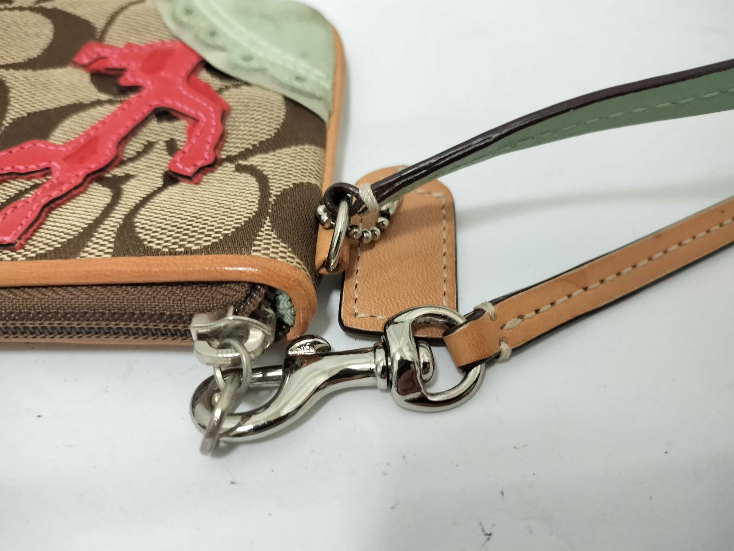 COACH Signature Wristlet Pouch with Fish and Coral Design