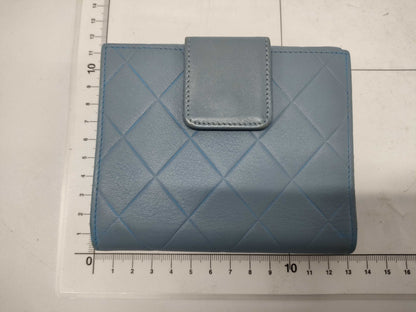 CHANEL folding wallet with sticker