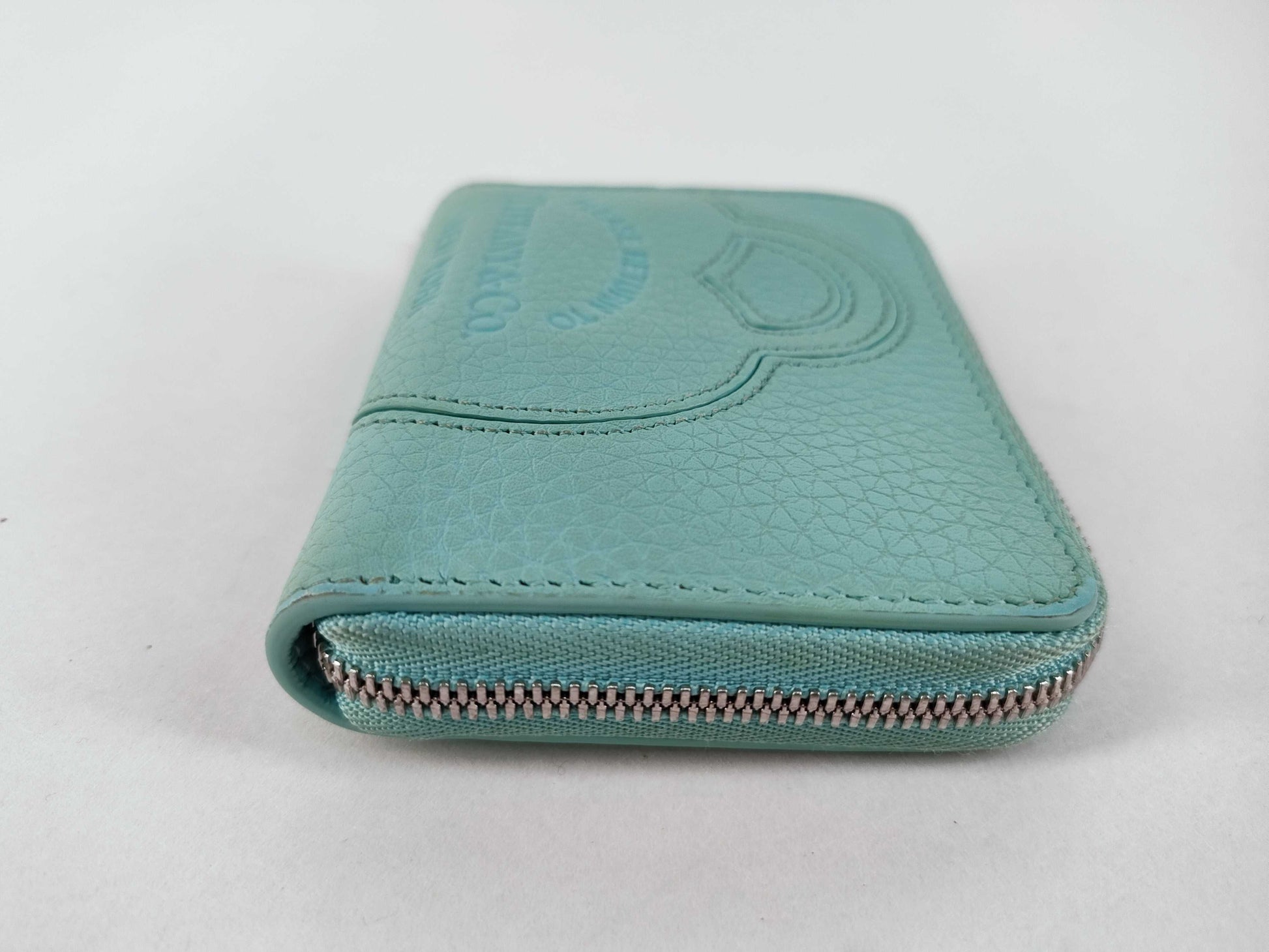 Tiffany & Co. Tiffany coin case mini wallet. Accessories: Box, wallet.