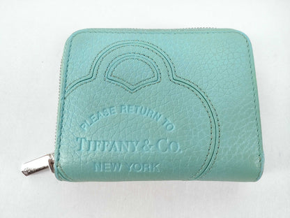 Tiffany & Co. Tiffany coin case mini wallet. Accessories: Box, wallet.