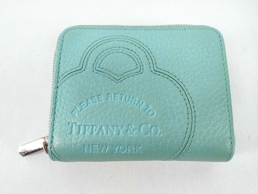 Tiffany & Co. Tiffany coin case mini wallet. Accessories: Box, wallet.