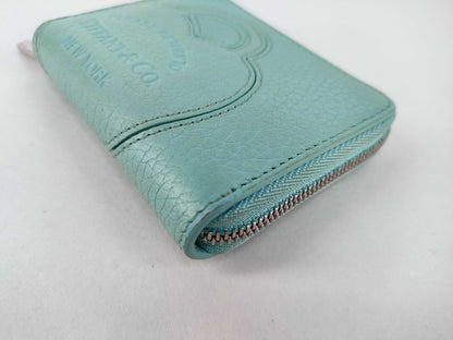Tiffany & Co. Tiffany coin case mini wallet. Accessories: Box, wallet.