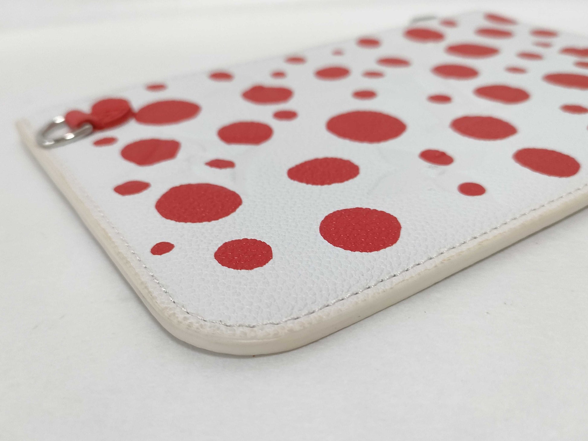 LOUIS VUITTON Monogram Empreinte Louis Vuitton Yayoi Kusama Infinity Dot Neverfull Pouch White/Red Monogram Empreinte Infinity Dot Silver Hardware Pouch