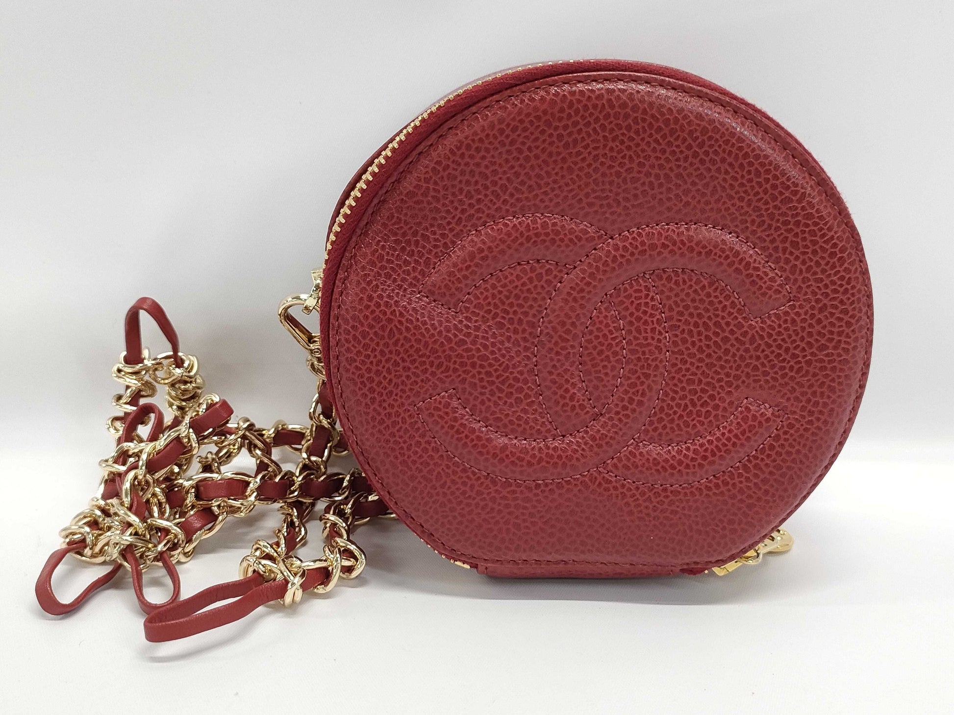 CHANEL Round Crossbody Pouch in Red Caviar Leather with Gold Hardware