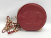 CHANEL Round Crossbody Pouch in Red Caviar Leather with Gold Hardware