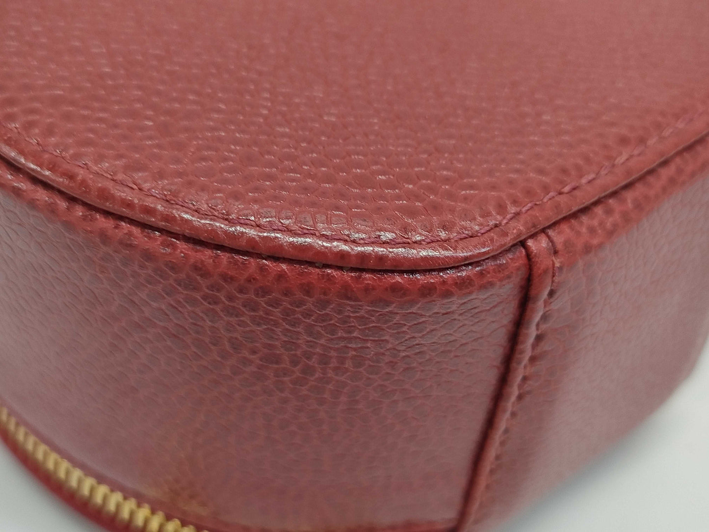 CHANEL Round Crossbody Pouch in Red Caviar Leather with Gold Hardware