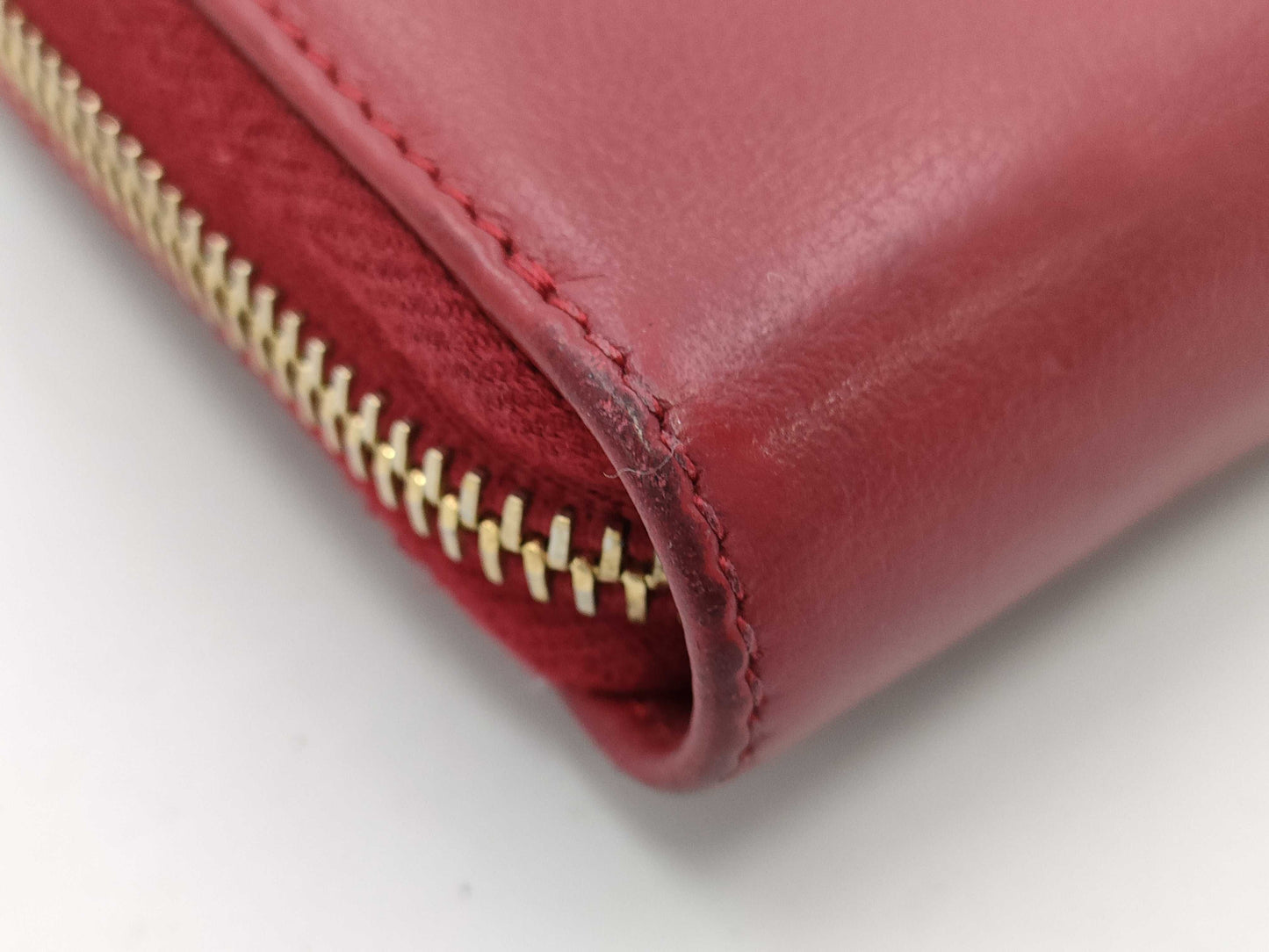 Yves Saint Laurent round zipper red wallet