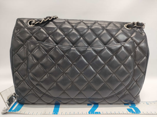 CHANEL Maxi Jumbo Matelasse 33 S Flap Shoulder Bag in Black Lambskin with Silver Hardware and Chain, Model A47600, 33 Series