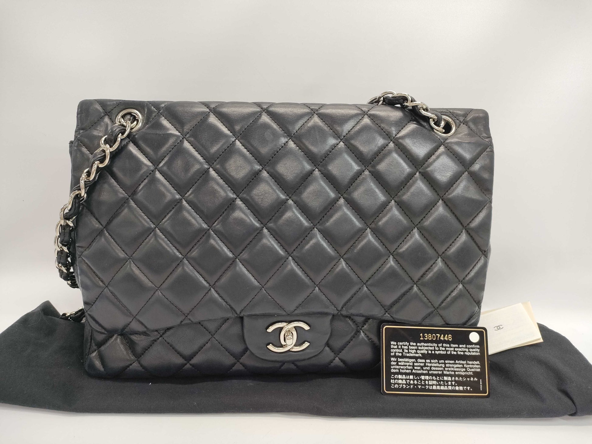 CHANEL Maxi Jumbo Matelasse 33 S Flap Shoulder Bag in Black Lambskin with Silver Hardware and Chain, Model A47600, 33 Series