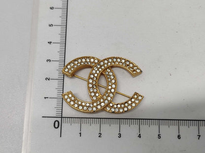 CHANEL GP Coco Mark Rhinestone Brooch Gold Brooch