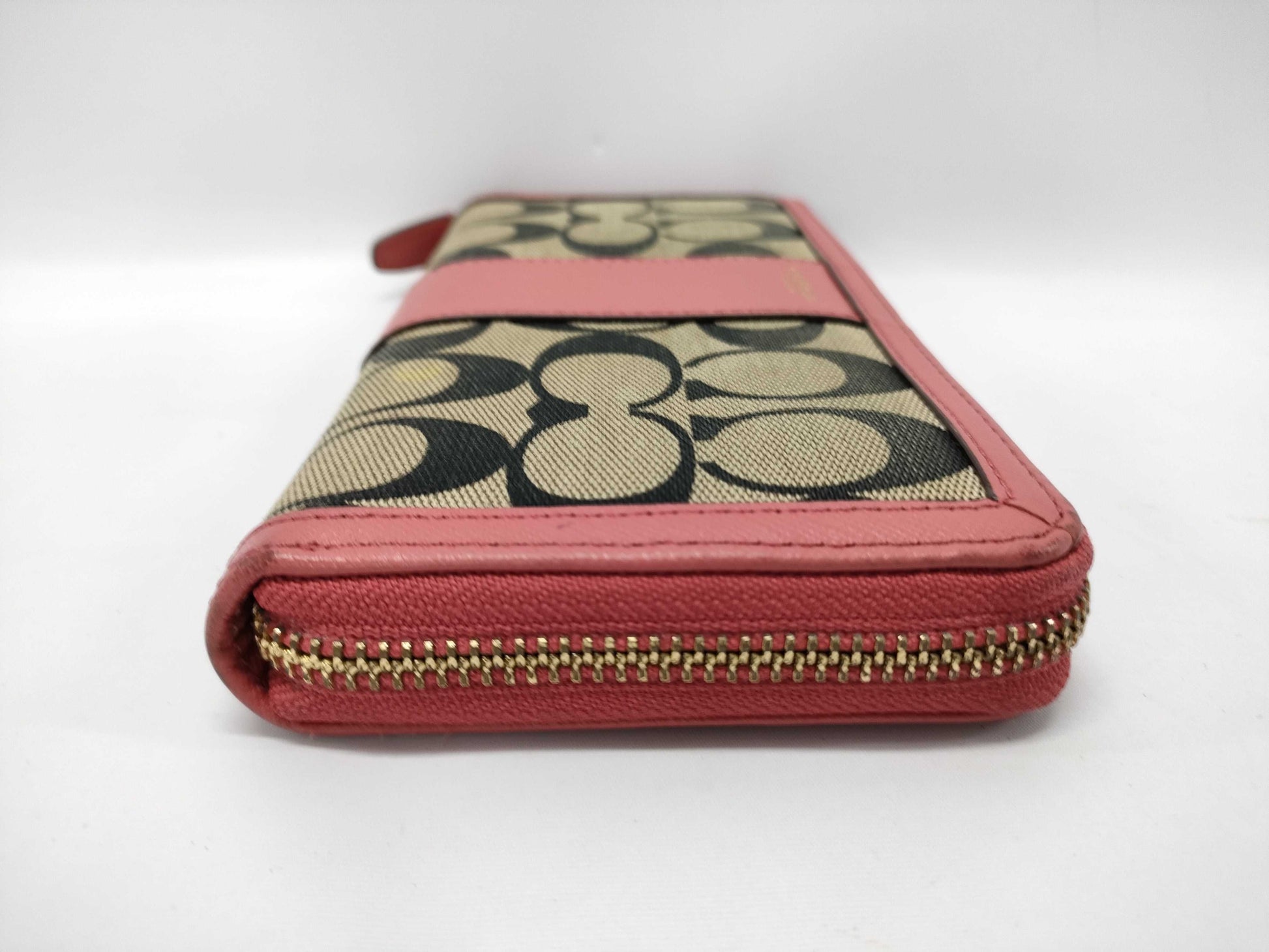 COACH Signature Zip-Around Canvas Leather Wallet in Beige and Pink