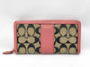 COACH Signature Zip-Around Canvas Leather Wallet in Beige and Pink