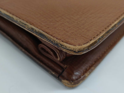 Burberry's Brown Leather Business Bag with Name Tag and Key