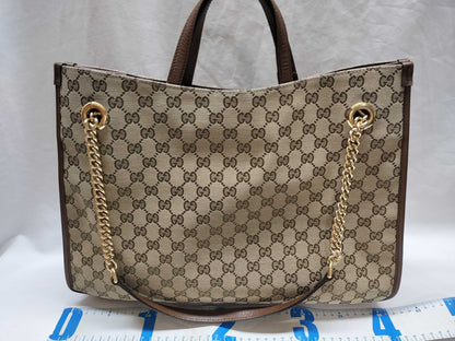 GUCCI GG Supreme Horsebit 1955 2-way tote bag in beige, brown, and gold hardware. GG canvas shoulder bag.