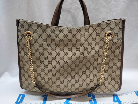 GUCCI GG Supreme Horsebit 1955 2-way tote bag in beige, brown, and gold hardware. GG canvas shoulder bag.
