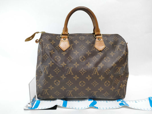 LOUIS VUITTON Monogram Louis Vuitton Monogram Speedy 30 Handbag