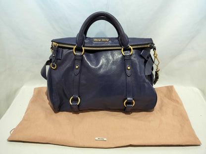 Miu Miu Vitello 2-way shoulder bag with side ribbon in purple