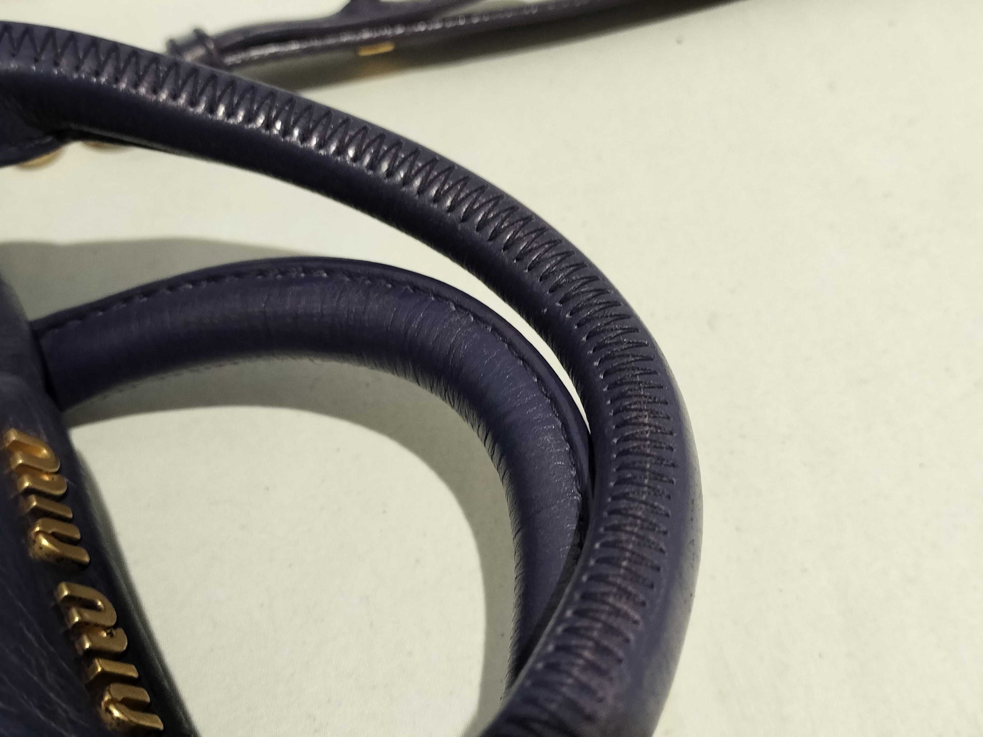 Miu Miu Vitello 2-way shoulder bag with side ribbon in purple