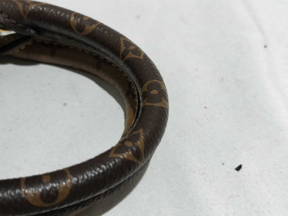 LOUIS VUITTON Monogram LOUIS VUITTON On the Go PM Tourtrell Creme Two-Tone Monogram Empreinte Leather Handbag