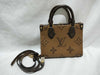 LOUIS VUITTON Monogram LOUIS VUITTON On the Go PM Tourtrell Creme Two-Tone Monogram Empreinte Leather Handbag