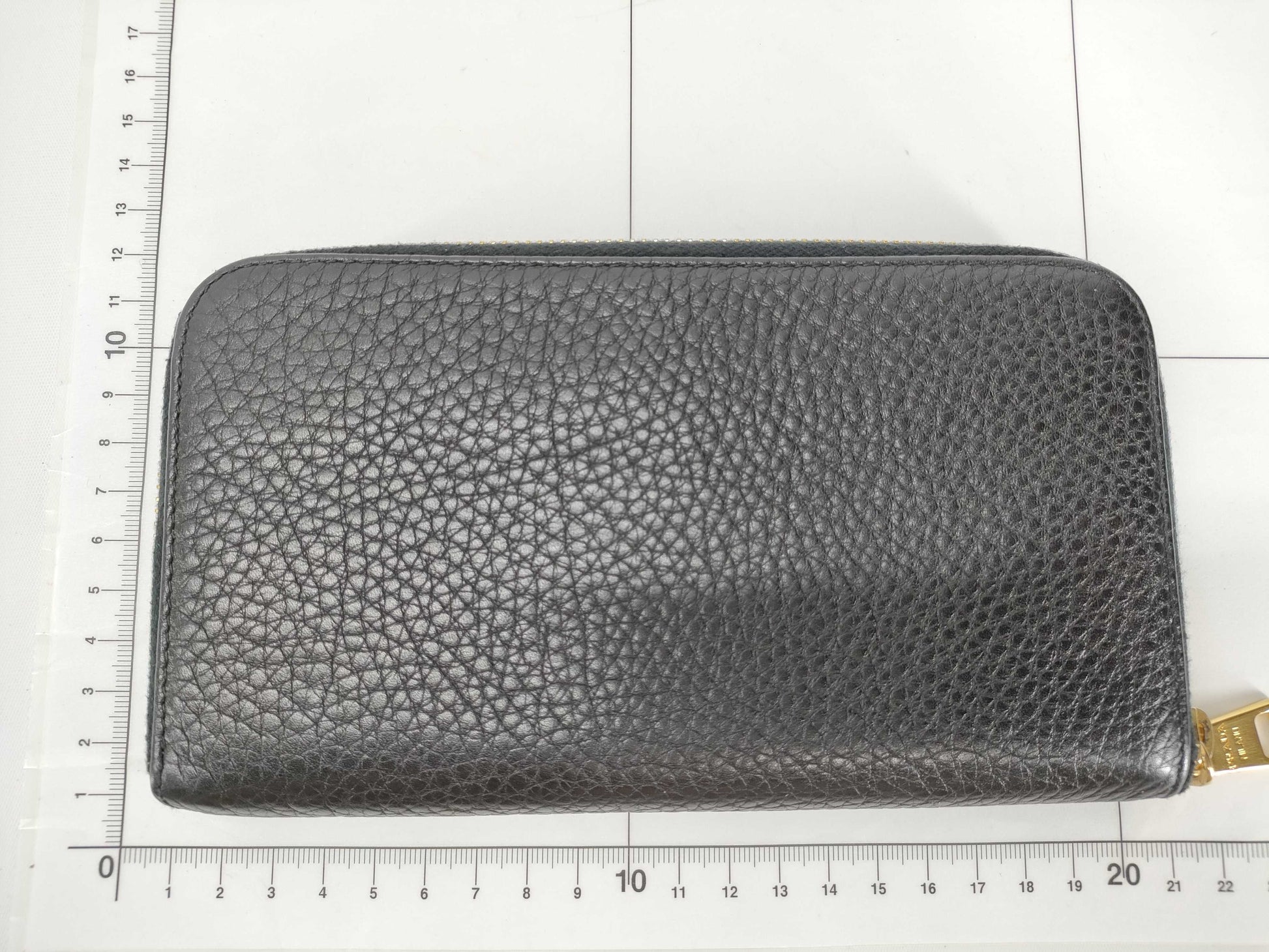 PRADA Vitello Dino 1M0506 Leather Round Zip Wallet in Black