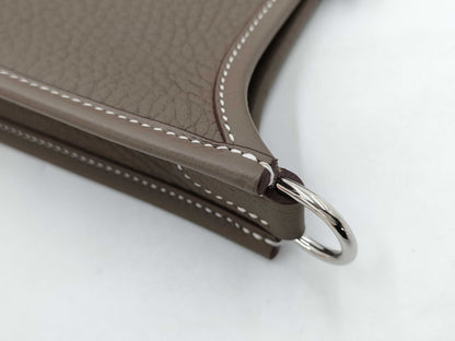 HERMES Evelyn TPM Taurillon Clemence Etoupe/Blue Indigo Shoulder Bag with Silver Hardware and Double Stamp