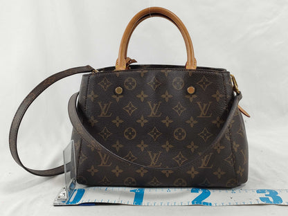 LOUIS VUITTON Monogram Louis Vuitton Montaigne Bag Handbag