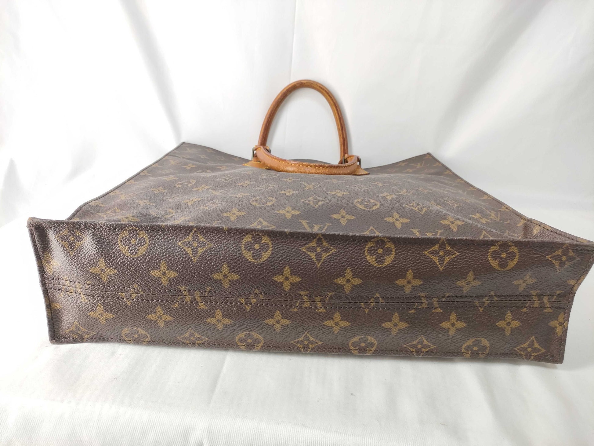 LOUIS VUITTON Monogram Louis Vuitton Sack Pla Monogram Handbag