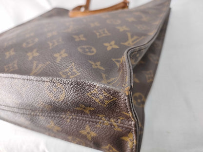 LOUIS VUITTON Monogram Louis Vuitton Sack Pla Monogram Handbag