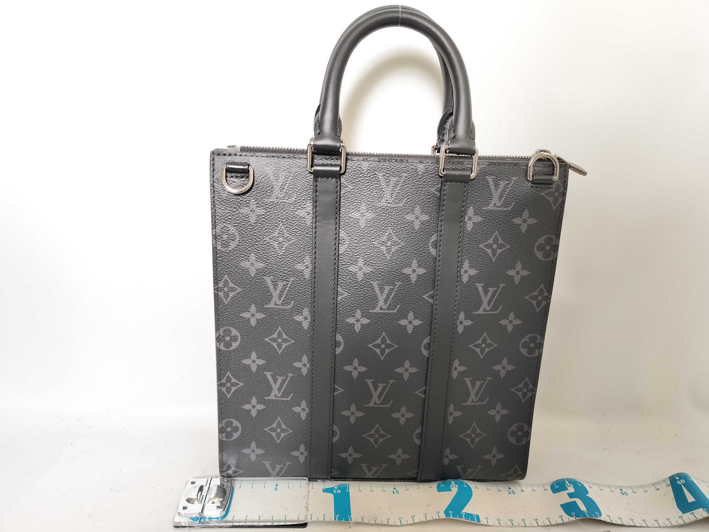 LOUIS VUITTON Monogram Eclipse Sack Pla Cross Handbag