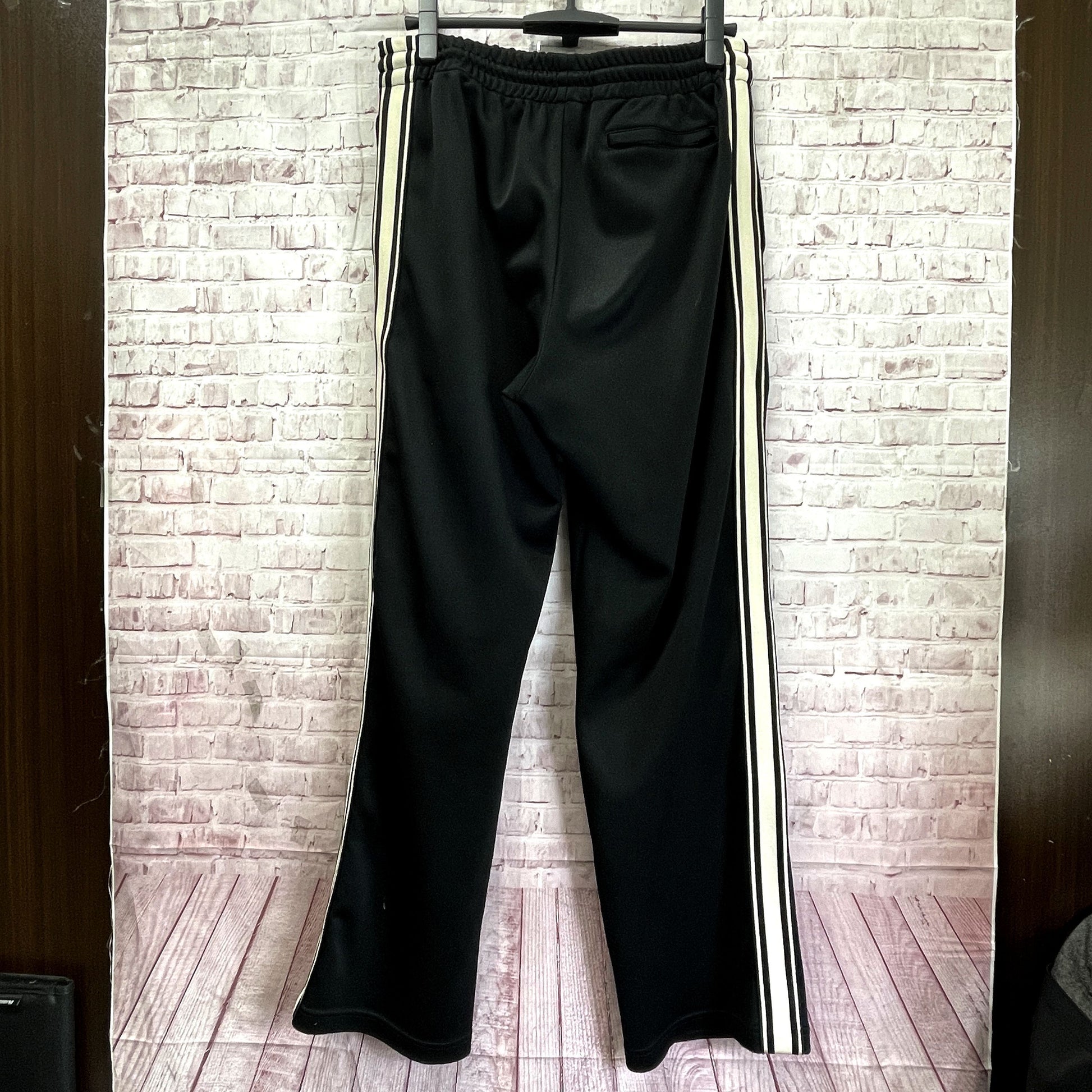 CELINE MBROIDERED TRACK PANTS Embroidered Sideline Track Pants Loose Fit Black 2Z0991210 Pants