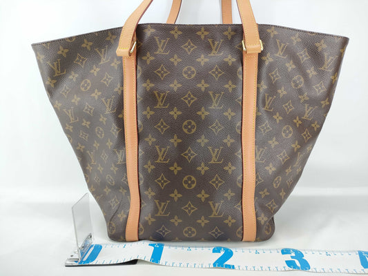 LOUIS VUITTON Monogram Louis Vuitton Monogram Sack Shopping Accessories: Pouch Tote Bag