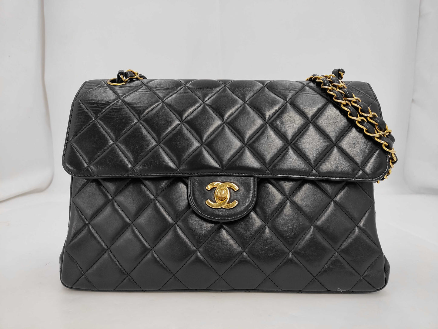 CHANEL Chain Shoulder Bag in Black and Gold