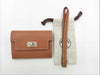 HERMES Evelyn TPMK Stamped Taurillon Leather Shoulder Bag with Silver Hardware and Red Strap