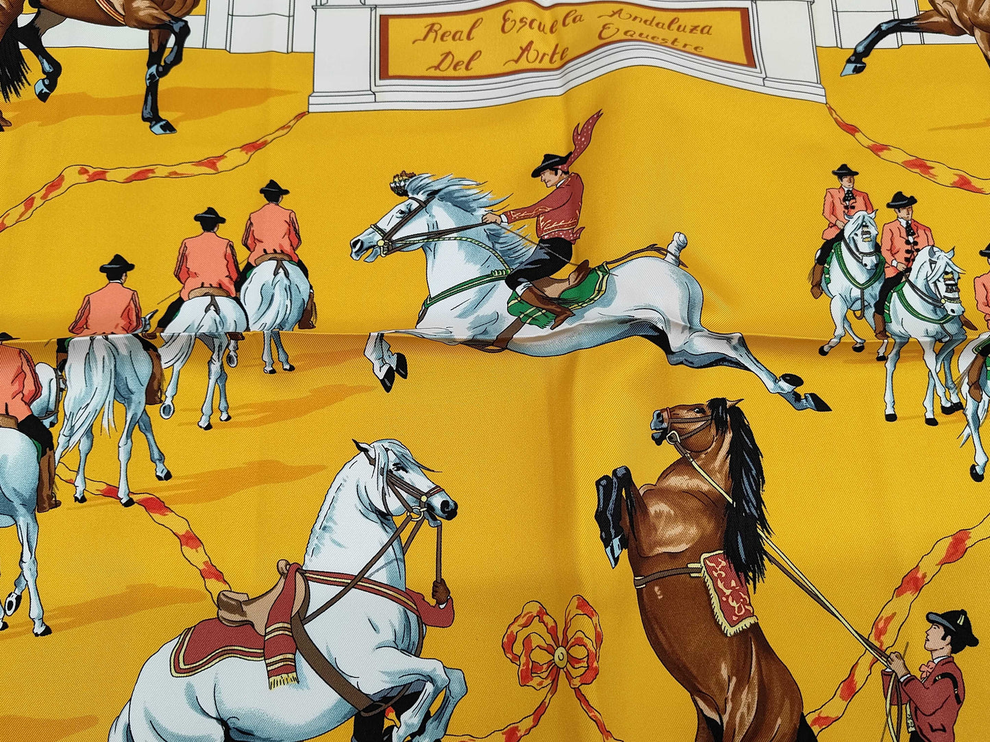 HERMES Silk Carré 90 "Real Escuela Andaluza Del Arte Ecuestre" Scarf in Yellow, Black, and Multicolor with Box