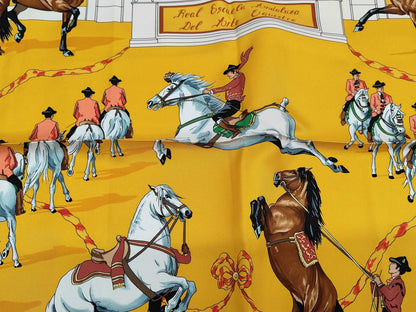 HERMES Silk Carré 90 "Real Escuela Andaluza Del Arte Ecuestre" Scarf in Yellow, Black, and Multicolor with Box