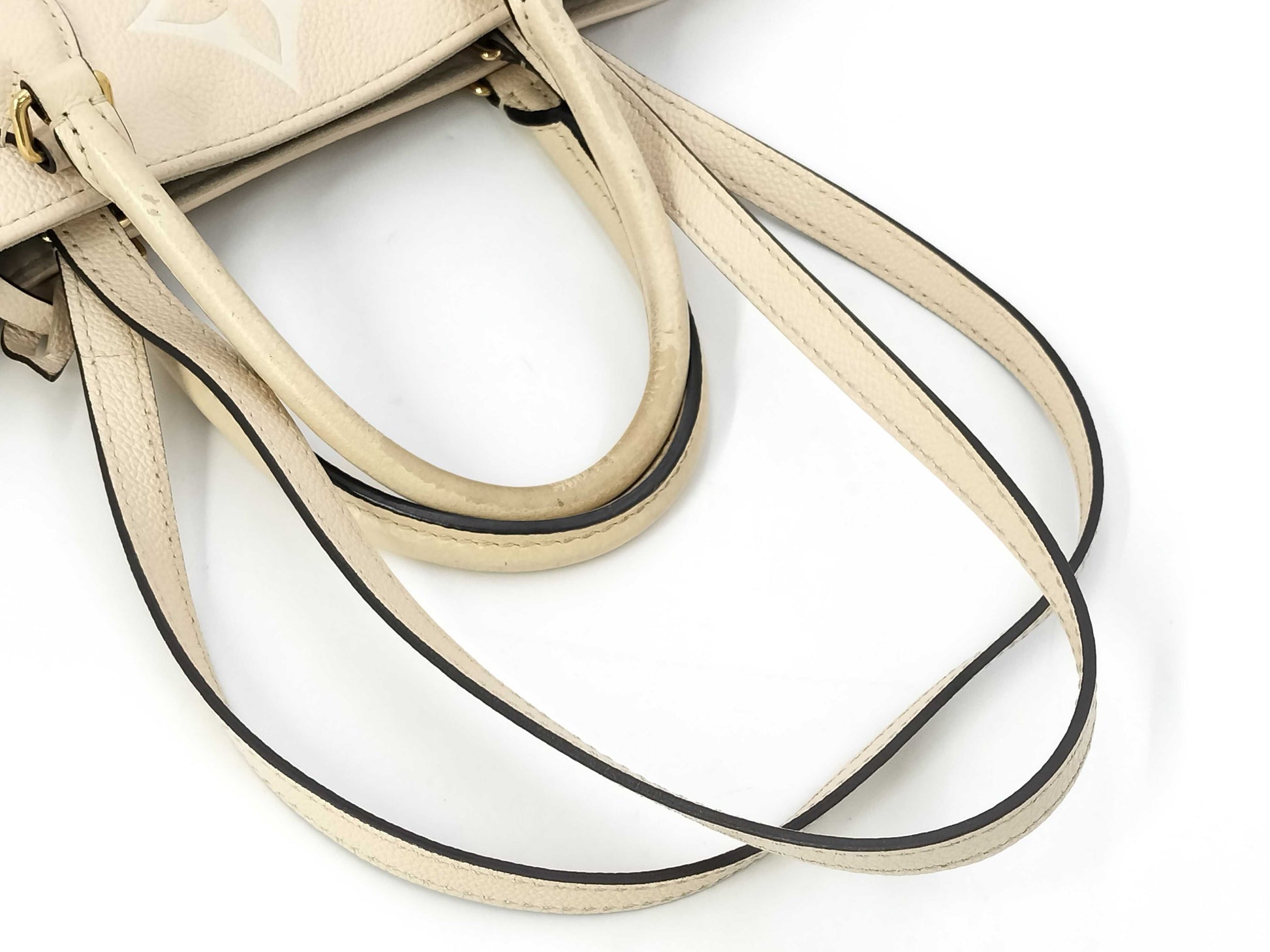 LOUIS VUITTON M45717 Monogram Empreinte On the Go MM Crème Saffron RFID Verified Tote Bag