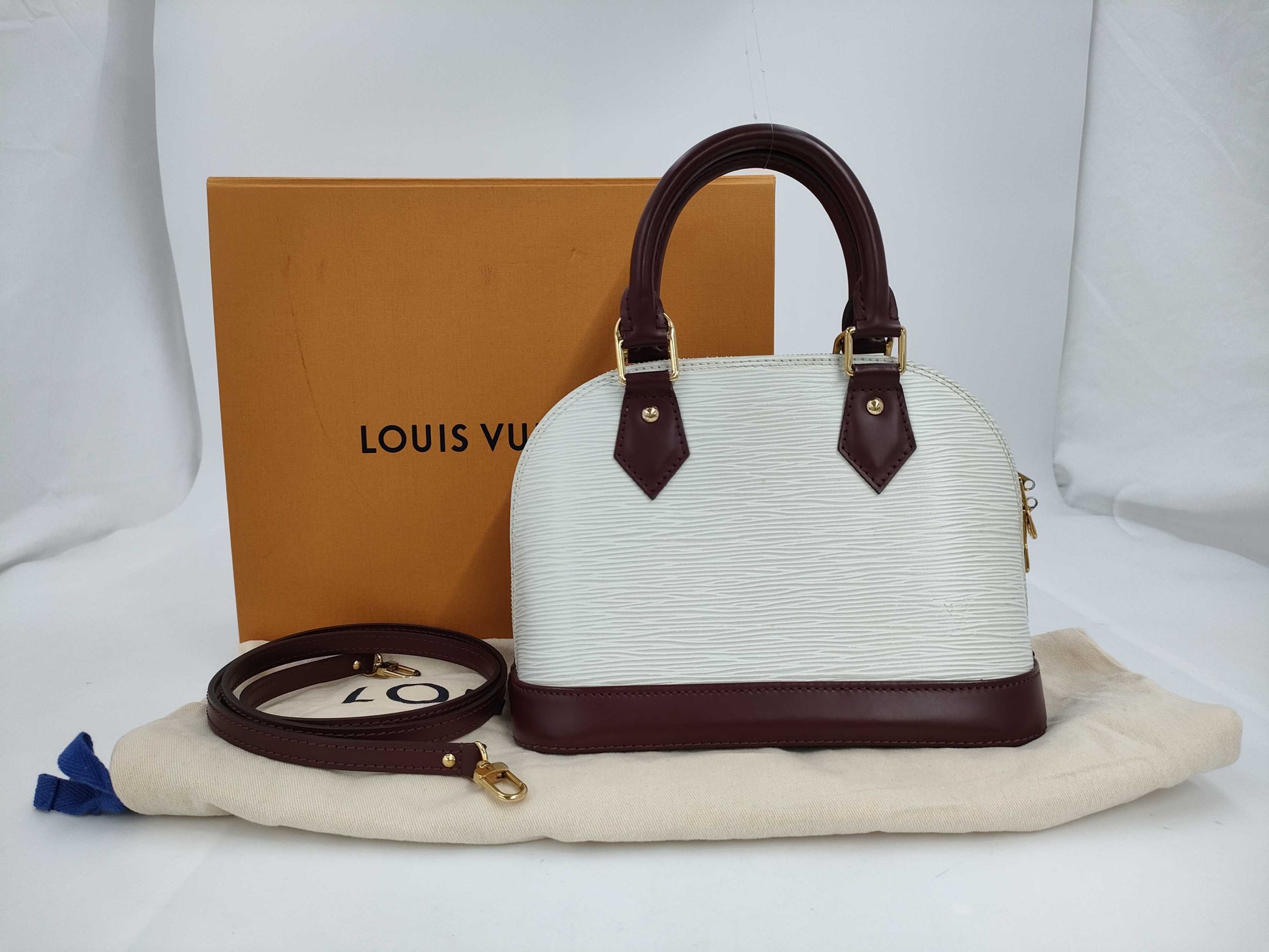 LOUIS VUITTON Epi Alma BB Handbag