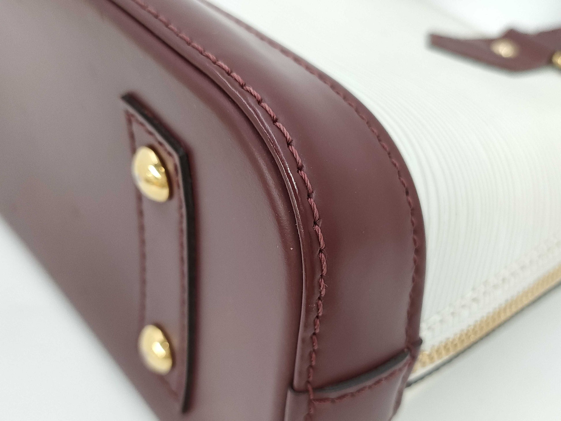 LOUIS VUITTON Epi Alma BB Handbag